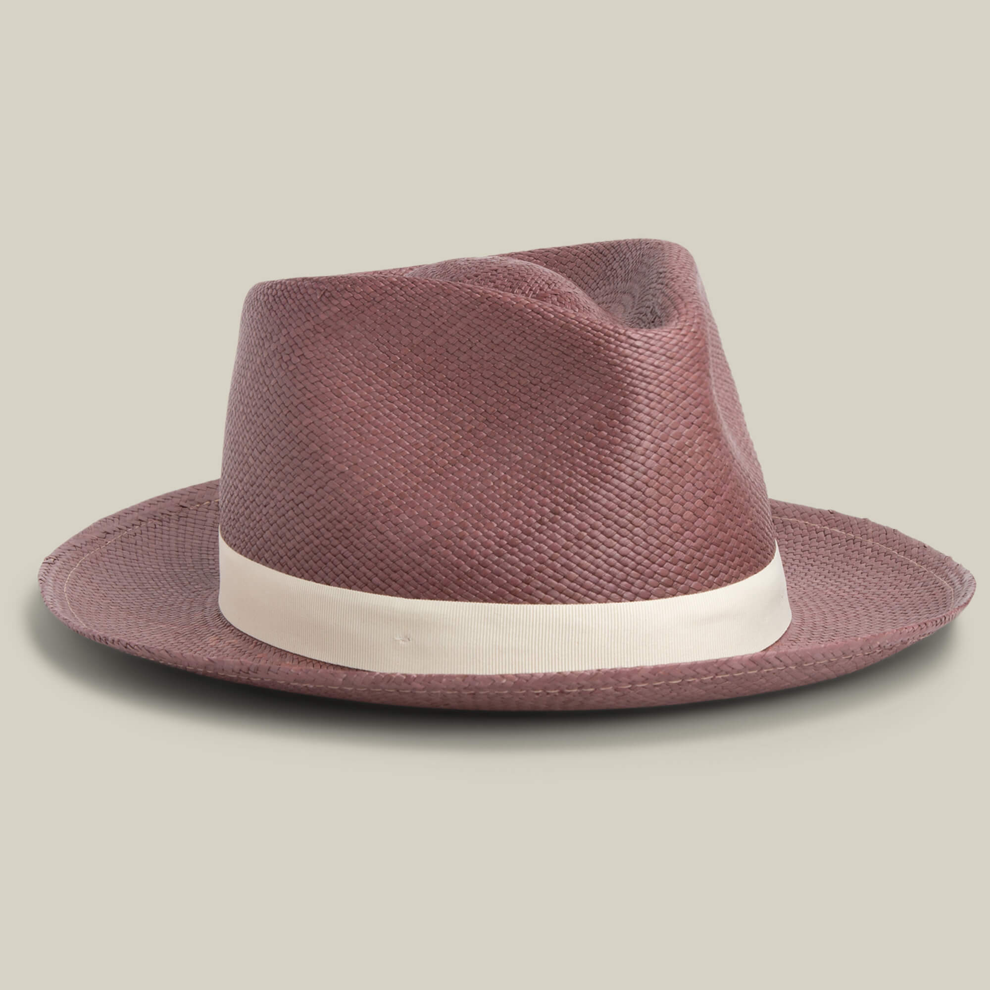 The Goorin Bros. John Sr. is a brown toquilla teardrop fedora with a wide brim and cream band, combining classic style and 50 UPF sun protection, shown on a neutral background.