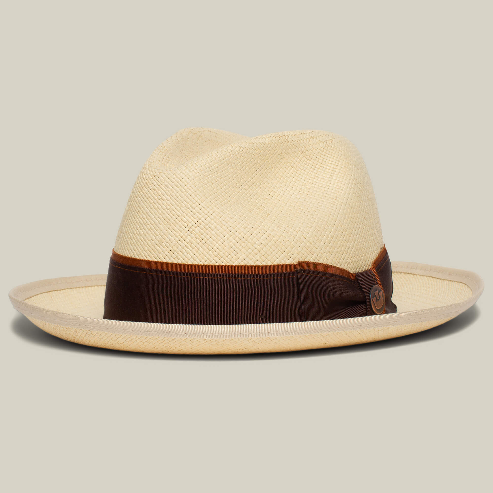 The Goorin Bros. Hartman is a beige straw fedora with a wide brim and dark brown grosgrain band, shown against a plain light background.