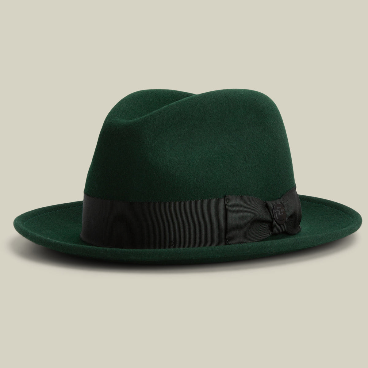 Introducing “Dean the Butcher” by Goorin Bros.—an American-made fedora in GUARD, featuring a wide black ribbon band and bow. Stylishly displayed on a neutral background, this versatile all-season hat is perfect for any occasion.