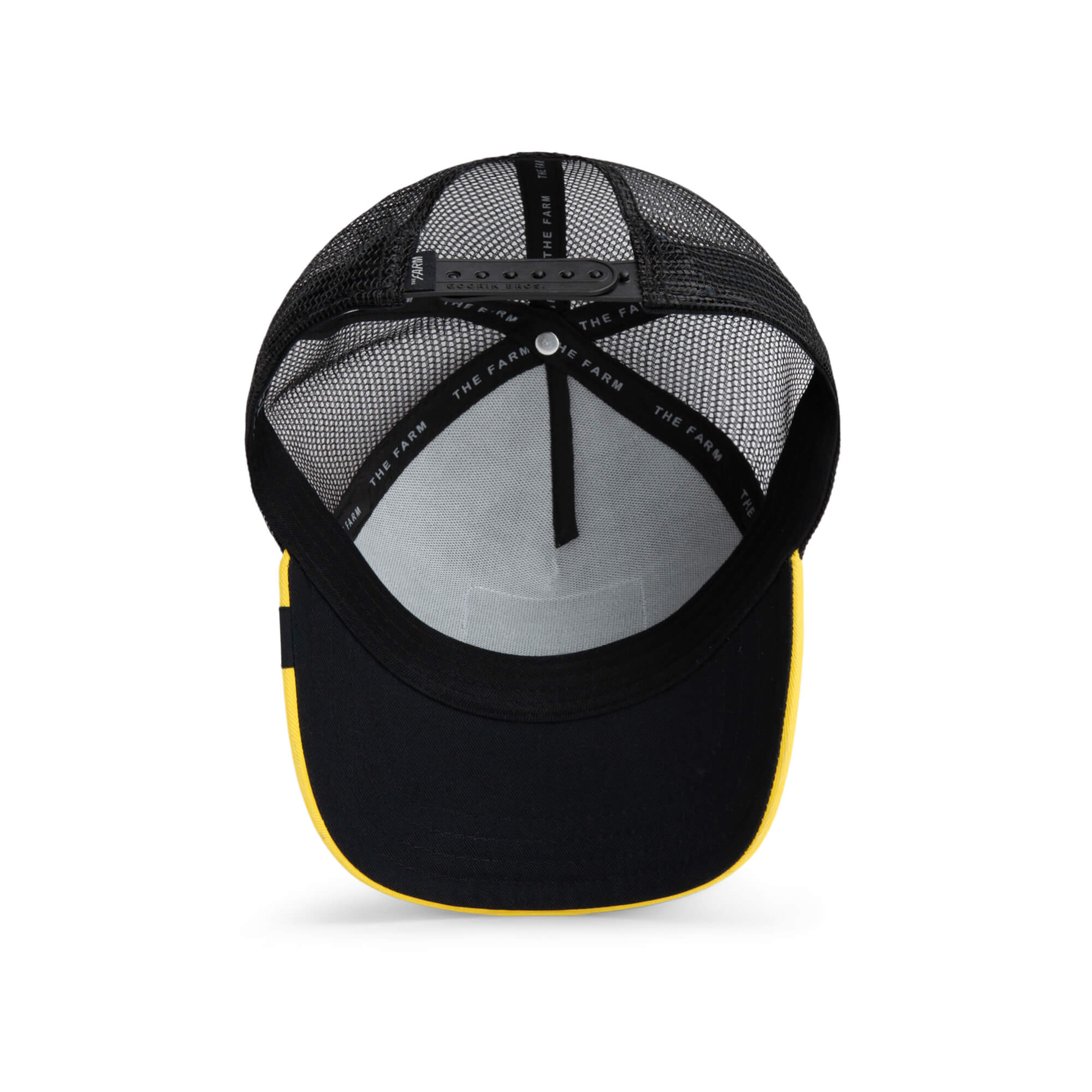 The Puff Puff Fish by The Farm is a black and yellow trucker hat with mesh back panels and an adjustable snapback closure. All sales final.