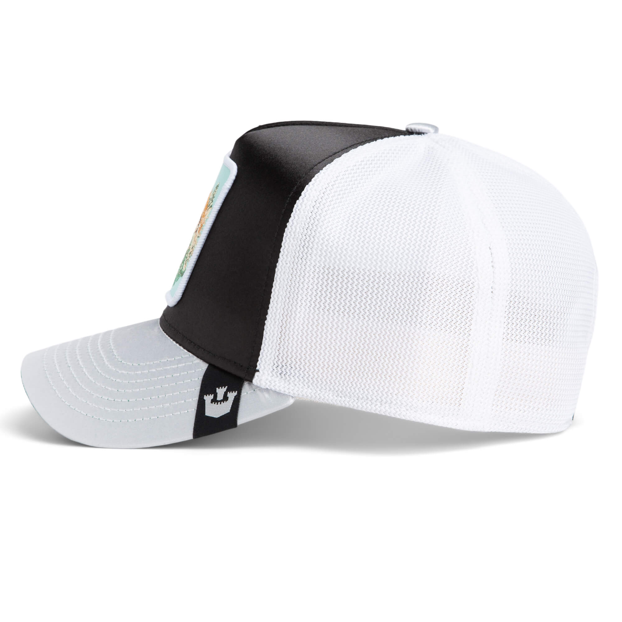 The Goorin Bros. "Get Blown" hat is a black and white mesh cap with a curved brim and an embroidered pufferfish patch on the front panel, displayed from a side angle.
