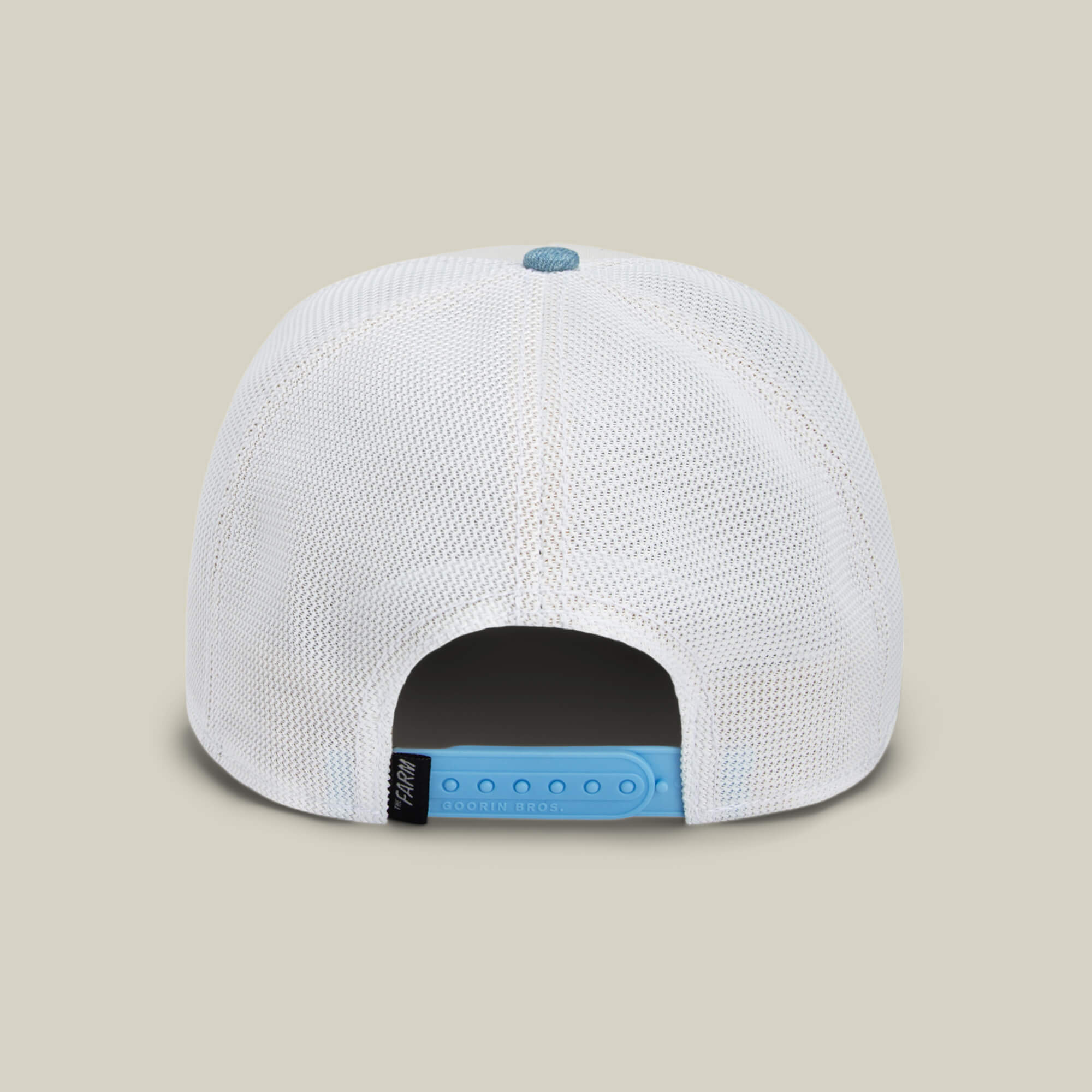 The Rooster Fan Institution Ball Club by Goorin Bros. is a white mesh baseball cap with an adjustable light blue snapback and a left-side label—perfect for game day and a sporty, relaxed style.