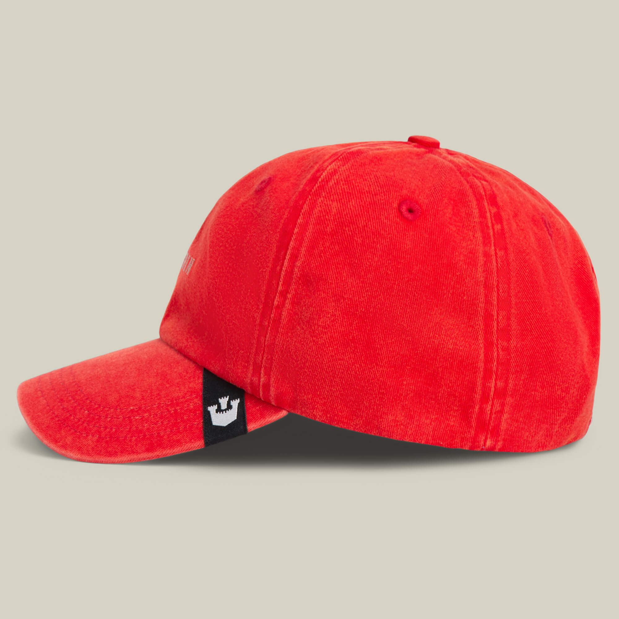 The Papa Cap Italiano by Goorin Bros. is a classic red baseball cap with a curved brim, shown from the side on a neutral background. A small black tag with a white logo accents the back strap, adding timeless appeal to this vintage style.