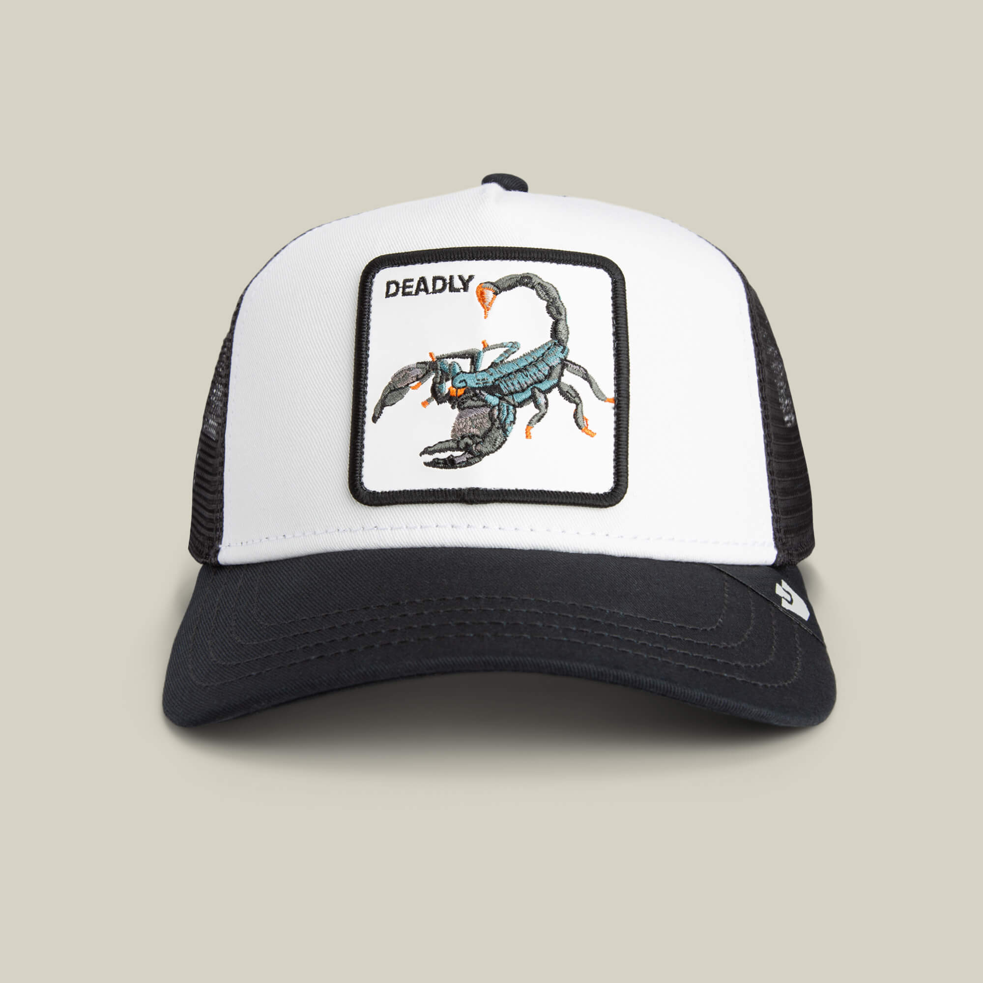 A DUST/VOID mesh hat by Goorin Bros., featuring a scorpion patch and the product name "Deadly" on the front.