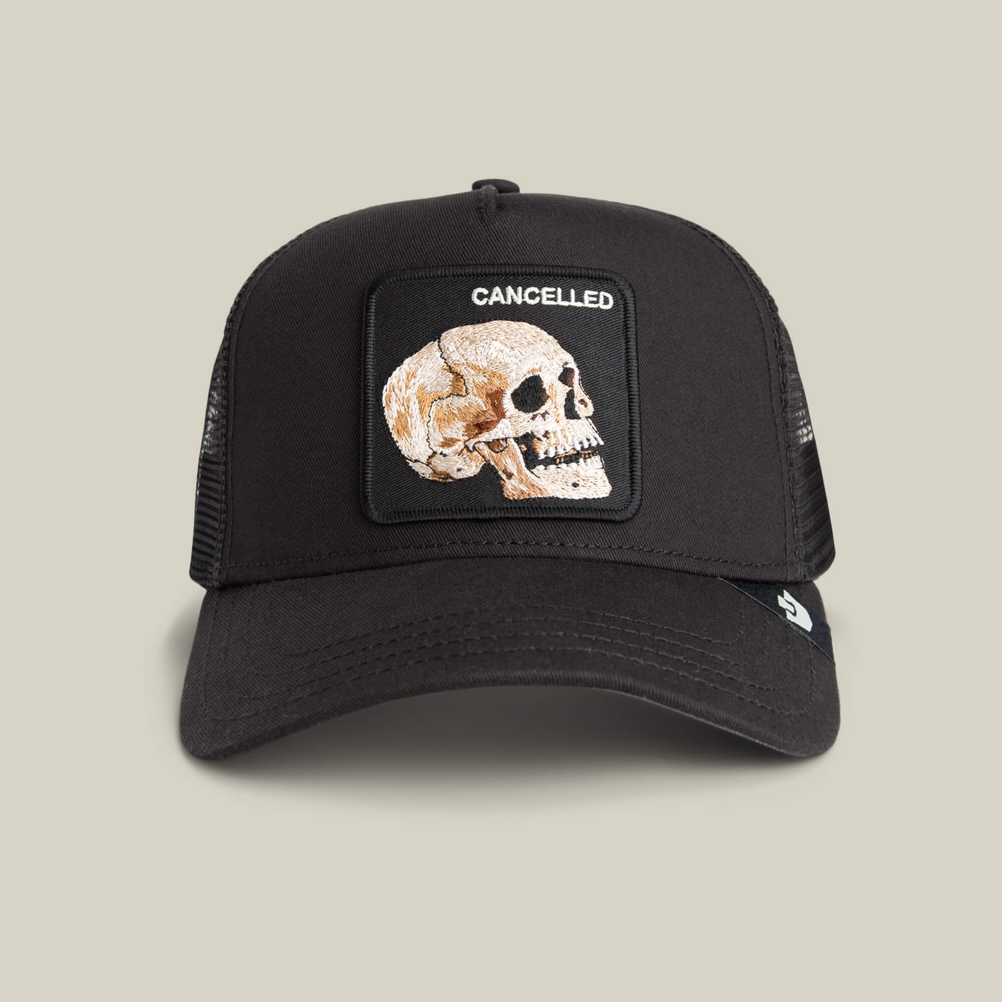 The Cancelled Skull by Goorin Bros. is a black trucker hat with a stitched skull patch and "CANCELLED" above it—ideal for bold self-expression.