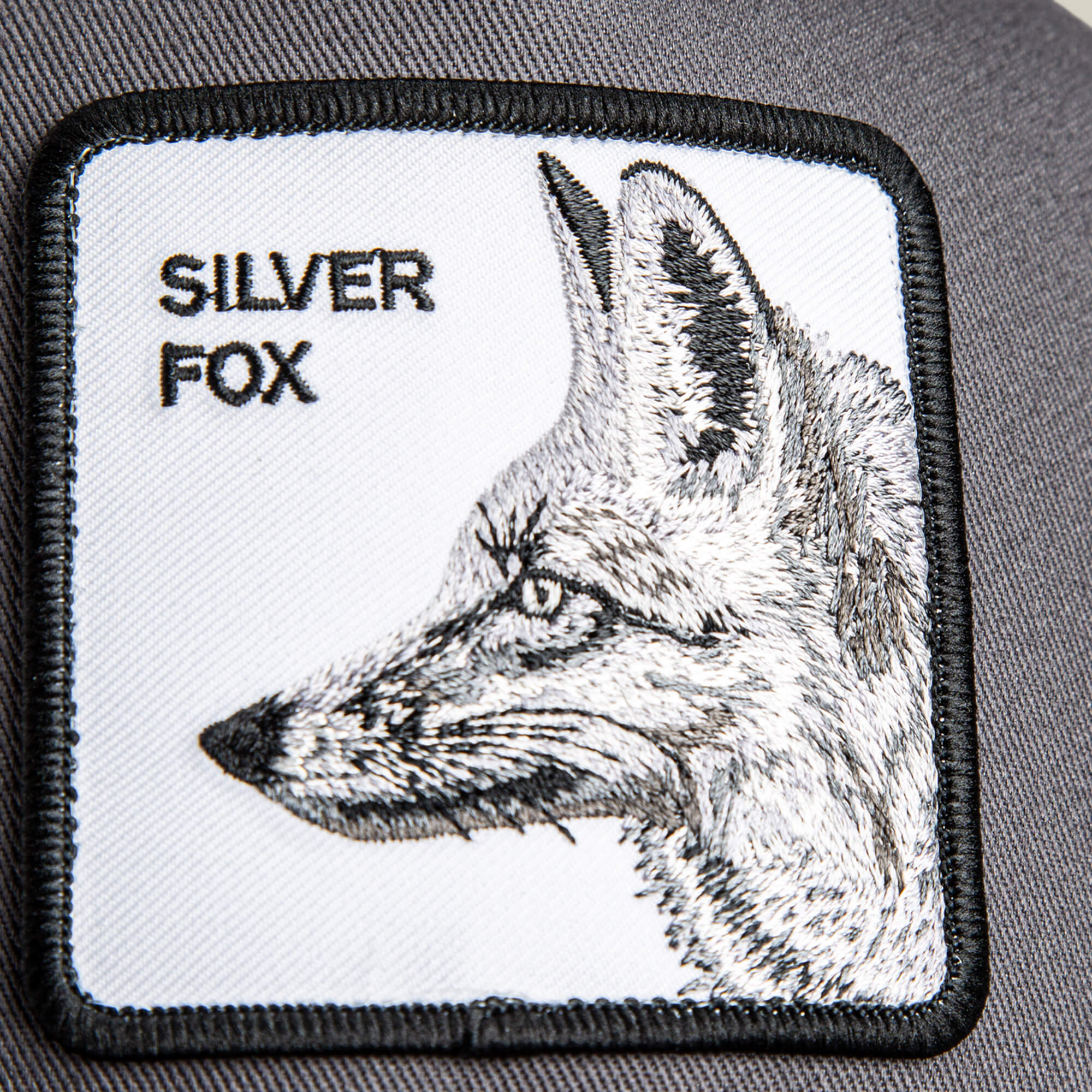 A rectangular patch by Goorin Bros. features an embroidered fox head in profile and the text "Silver Foxxx" in black on white—perfect for adding flair to hats or caps.