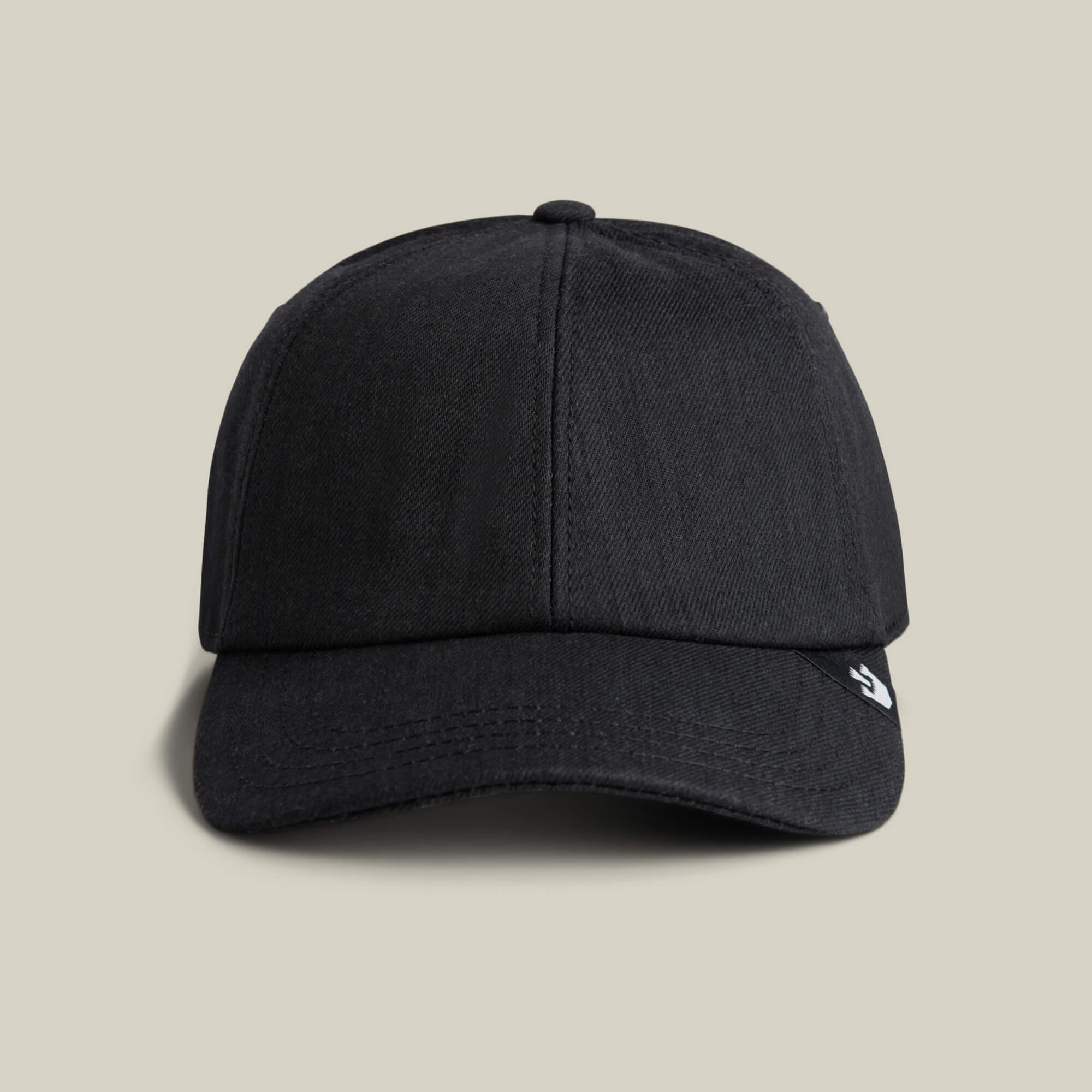 The Goorin Bros. Clean Denim Papa dad cap, shown front-facing against a neutral background, features a small white logo tag on the left side of its brim.