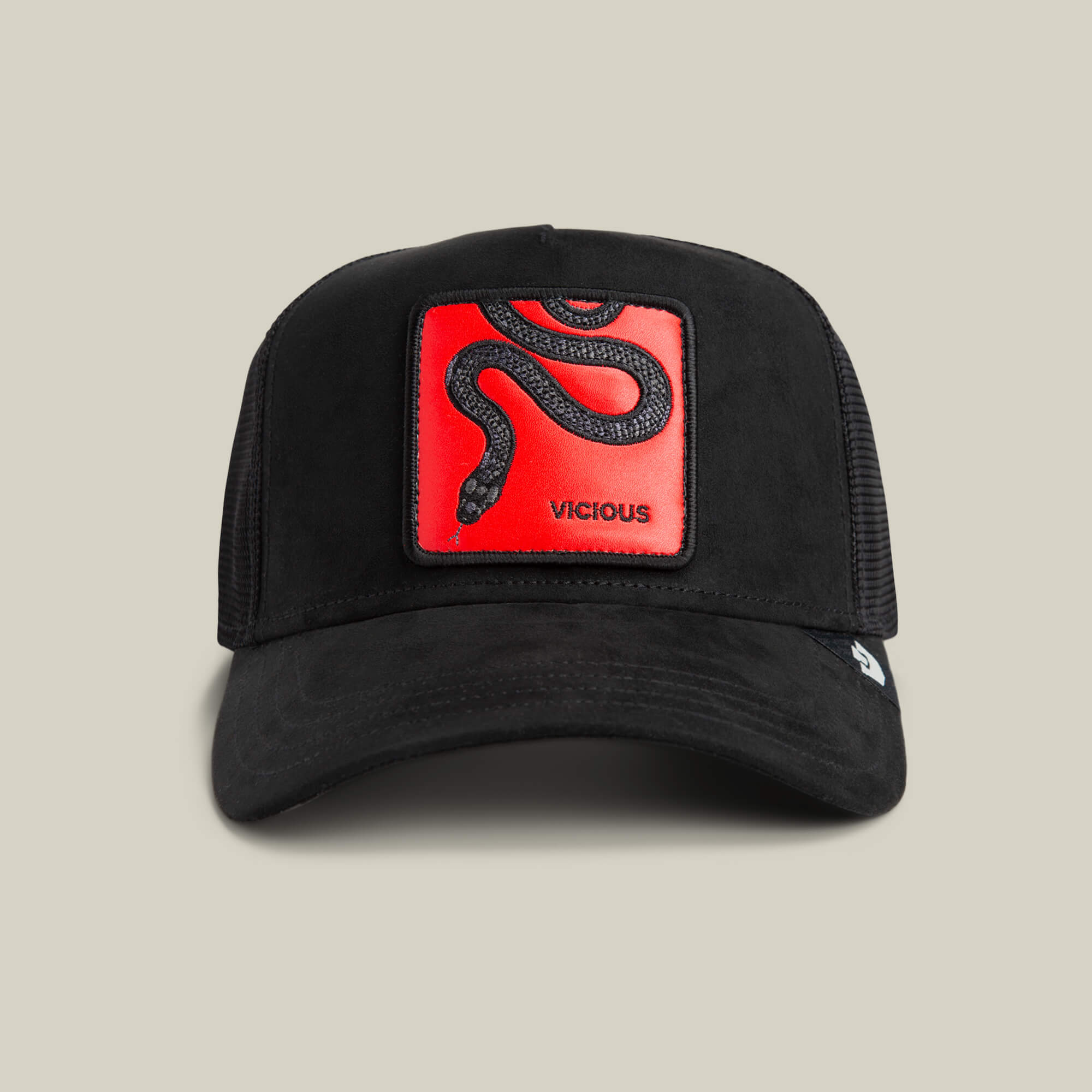 The Serpente Rosso by Goorin Bros. is a black microsuede trucker hat with a red patch featuring a black snake and "VICIOUS" in gold—a bold tribute to its fiery namesake.