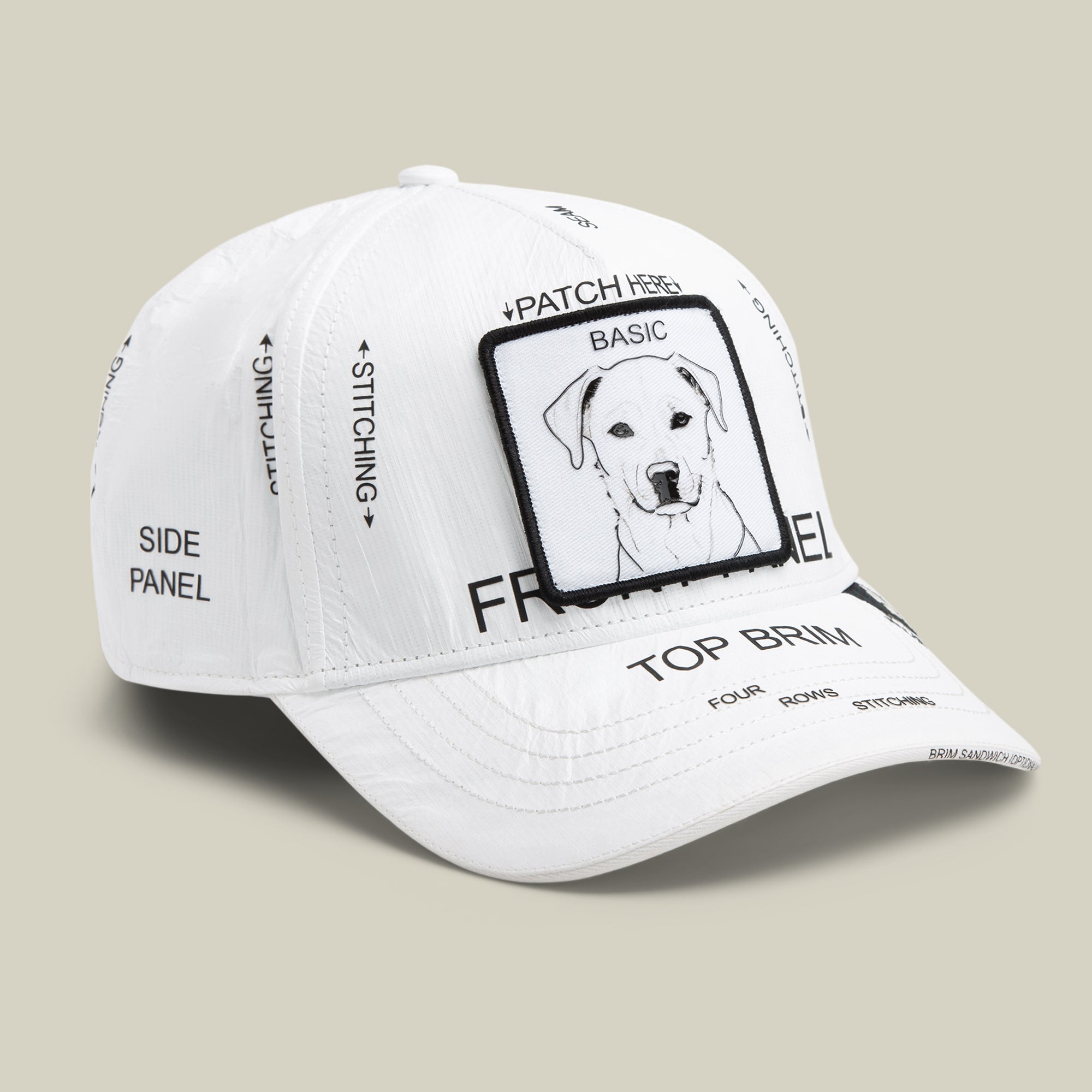 The Goorin Bros. K.I.S.S. cap is a limited edition white baseball hat with black text labeling its parts and a front patch displaying a line drawing of a dog's face.