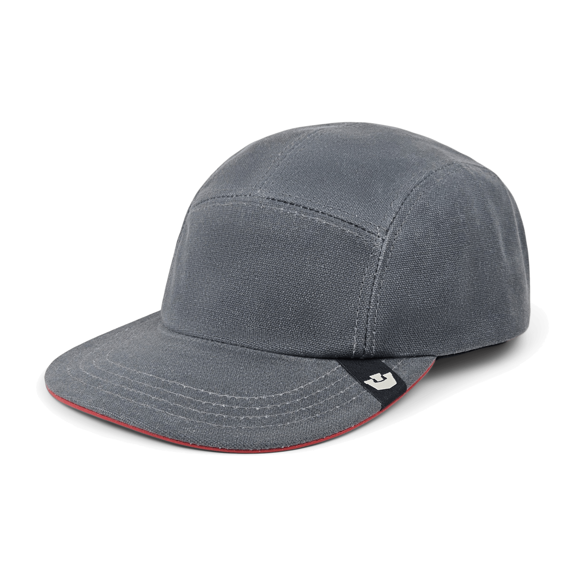 The North Boulder by Goorin Bros. is a grey cotton 5-panel camp cap with a slightly curved brim and a small black tag featuring a white logo on the left side, hand cut and sewn in the USA.