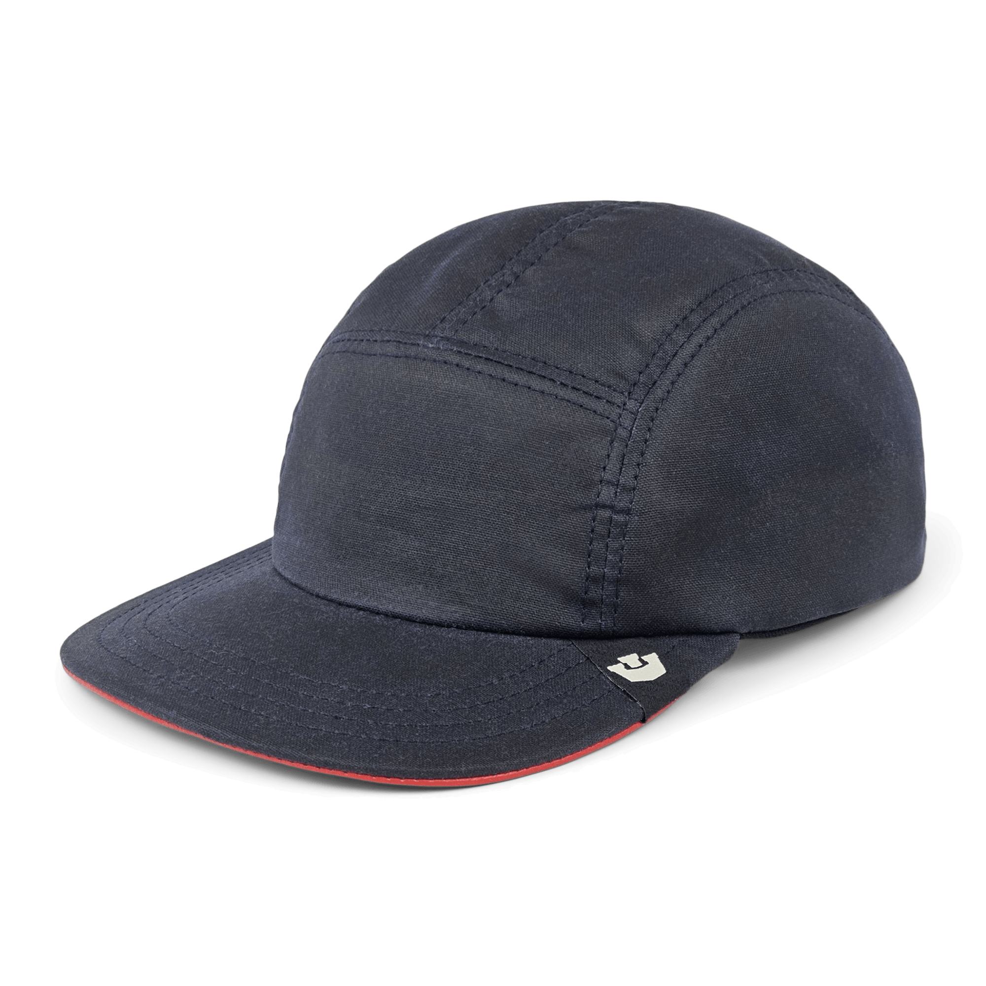 The North Boulder by Goorin Bros. is a dark navy 5-panel camp cap with visible stitching, flat brim, and a small beige logo tag on the front left side, hand cut and sewn in the USA.