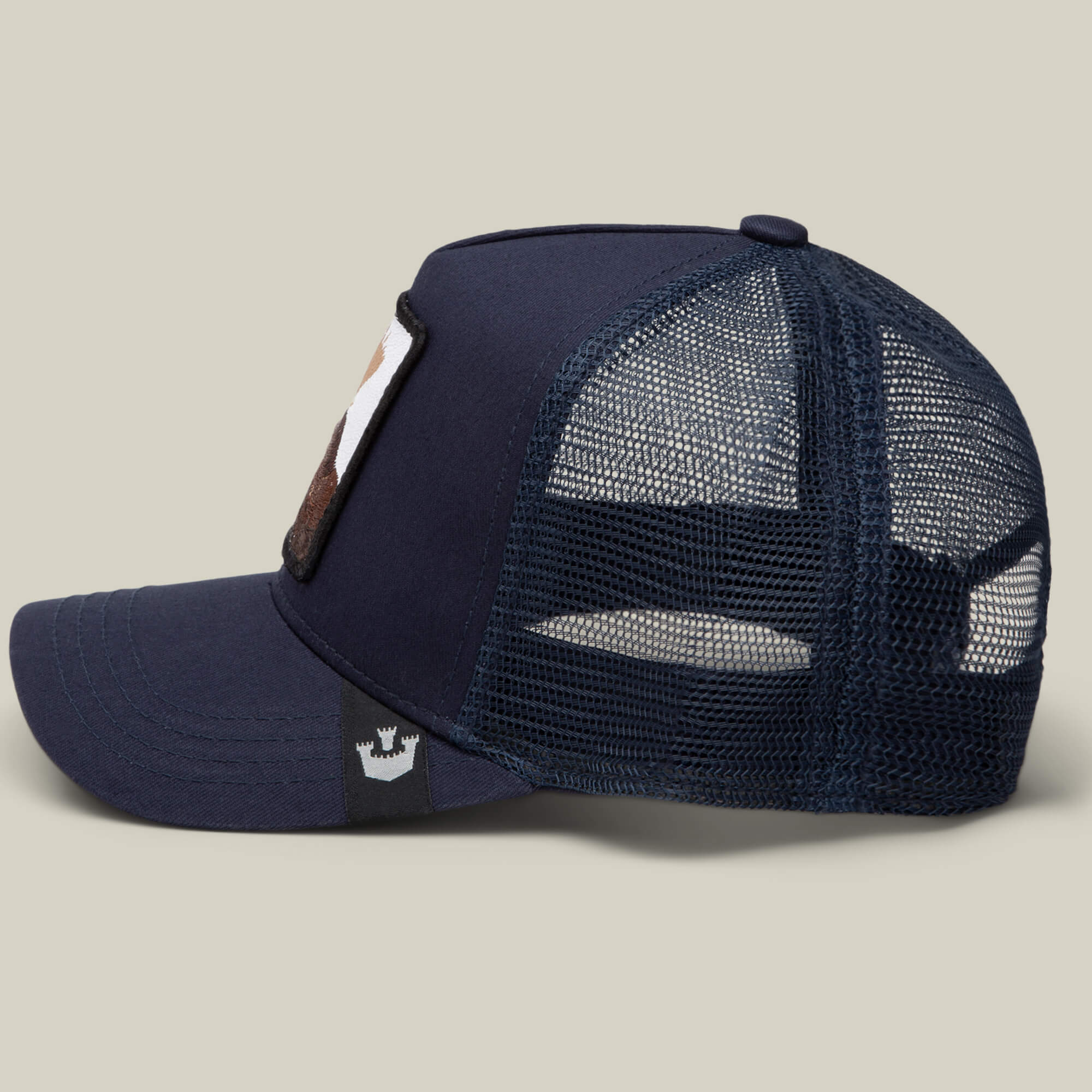 The Goorin Bros. Karlsson Moose navy blue mesh trucker cap features a profile view, front patch, and crown logo tag on the brim—perfect for Erik Karlsson fans.