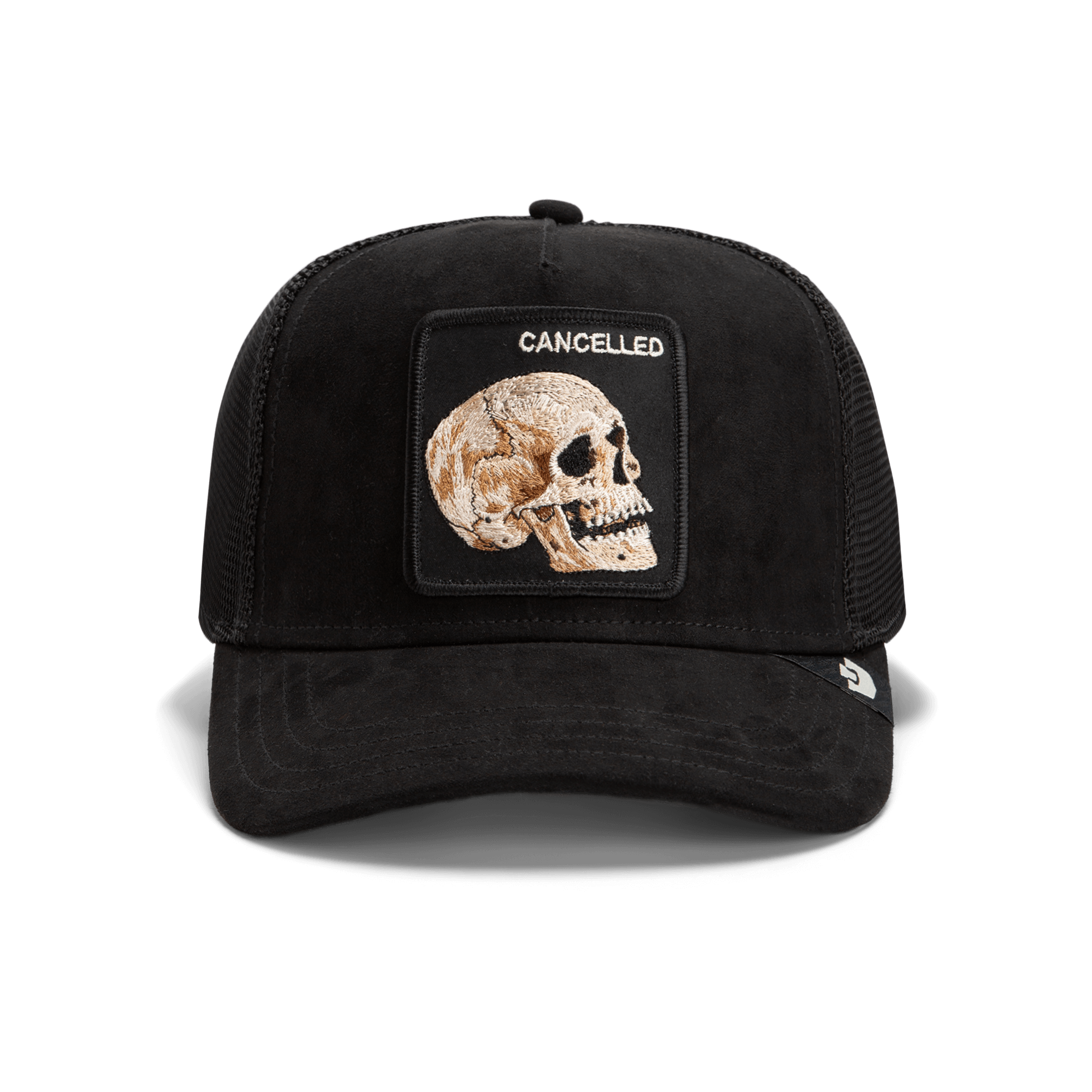 The Bold Suede Skull by Goorin Bros. is a limited edition trucker hat with a mesh back and a front patch featuring a stitched skull and the word "CANCELLED" above it.