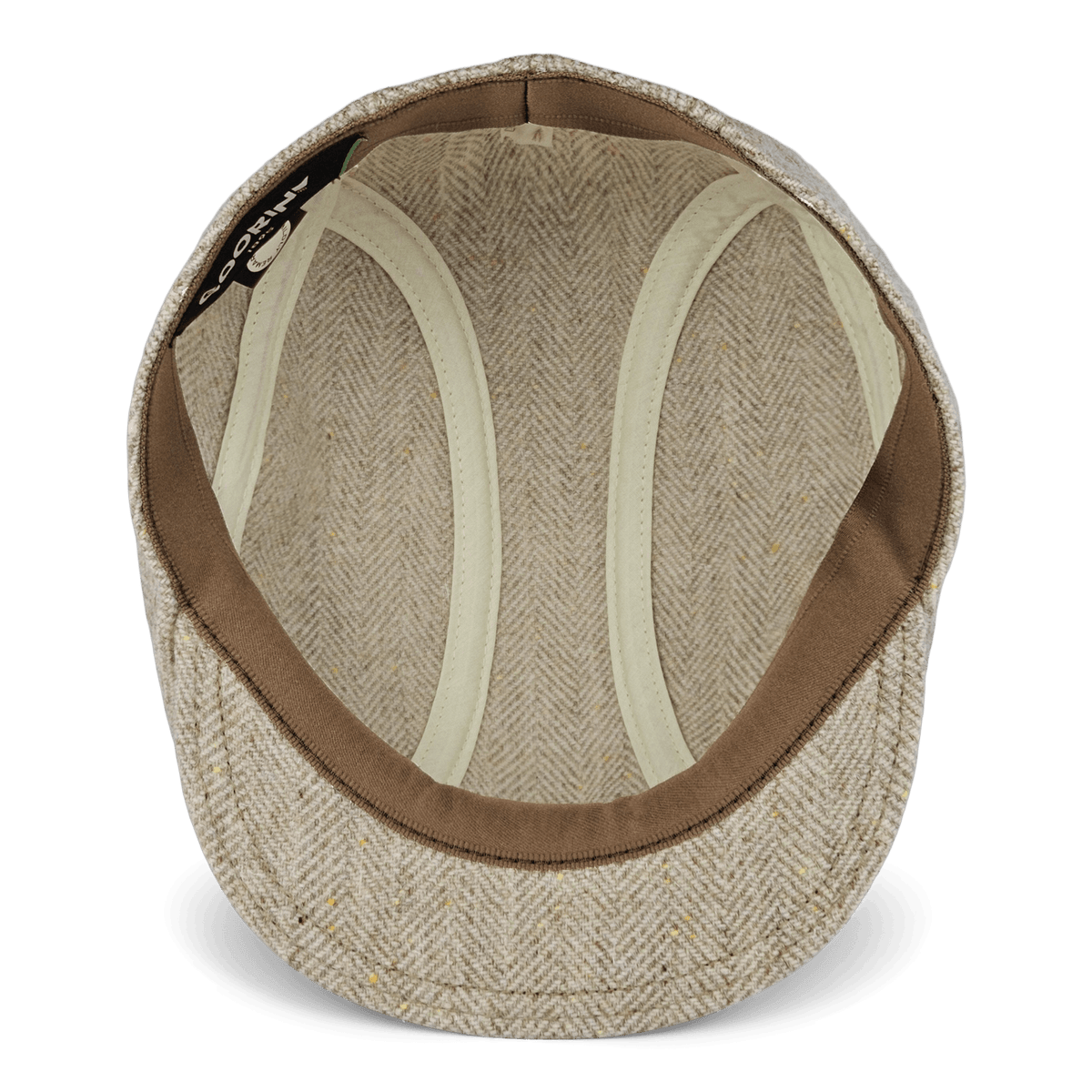 Top view of the Iris Fields flat cap by Goorin Bros., featuring beige herringbone wool with brown trim, a light inner lining, and a chalk cream color palette. Hand-cut in the USA from 100% wool, the image highlights the interior construction and displays a branded Goorin Bros. tag sewn into the inner seam.