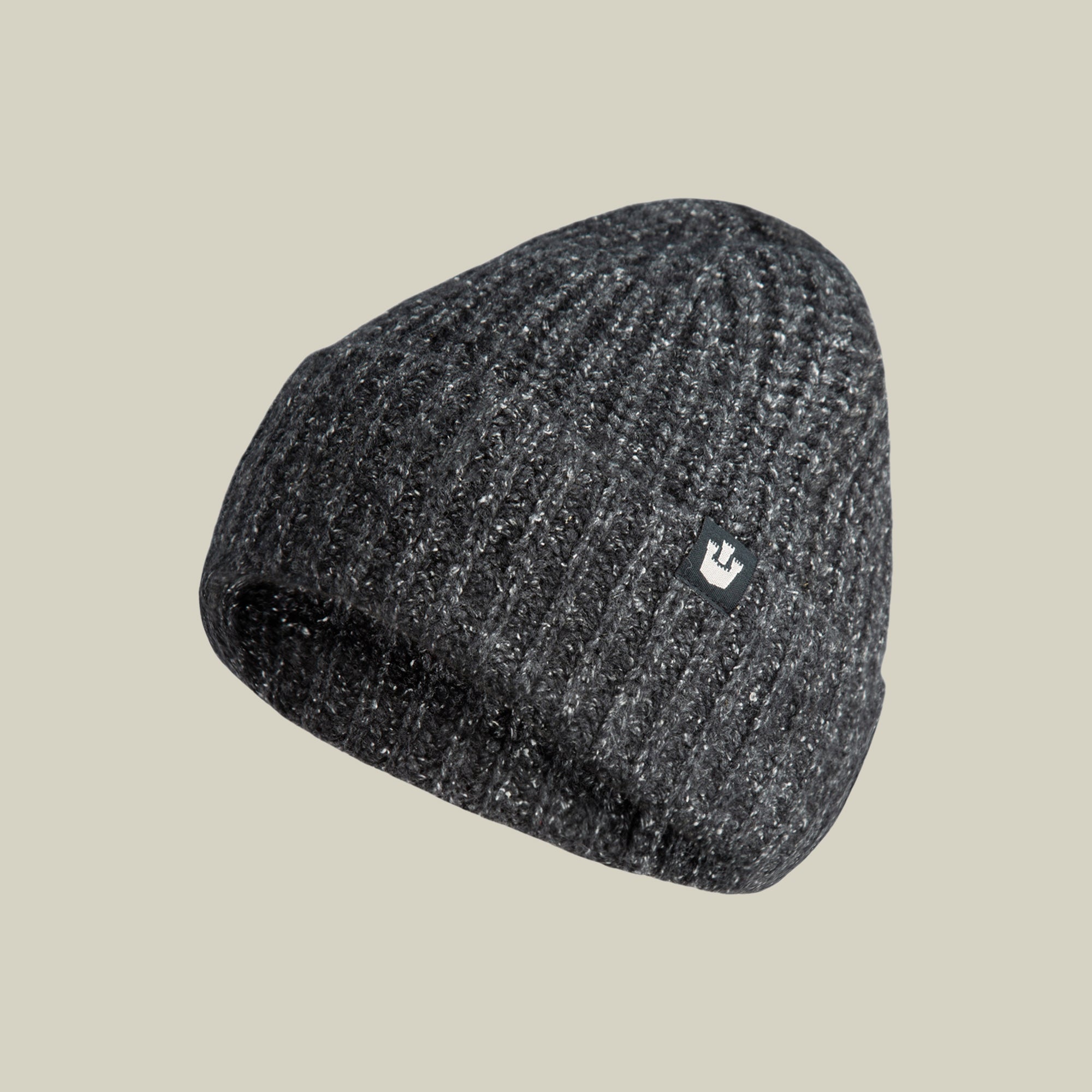 The Goorin Bros. Northstar beanie in charcoal features a small black and white rectangular logo patch on the front, shown against a plain light background.