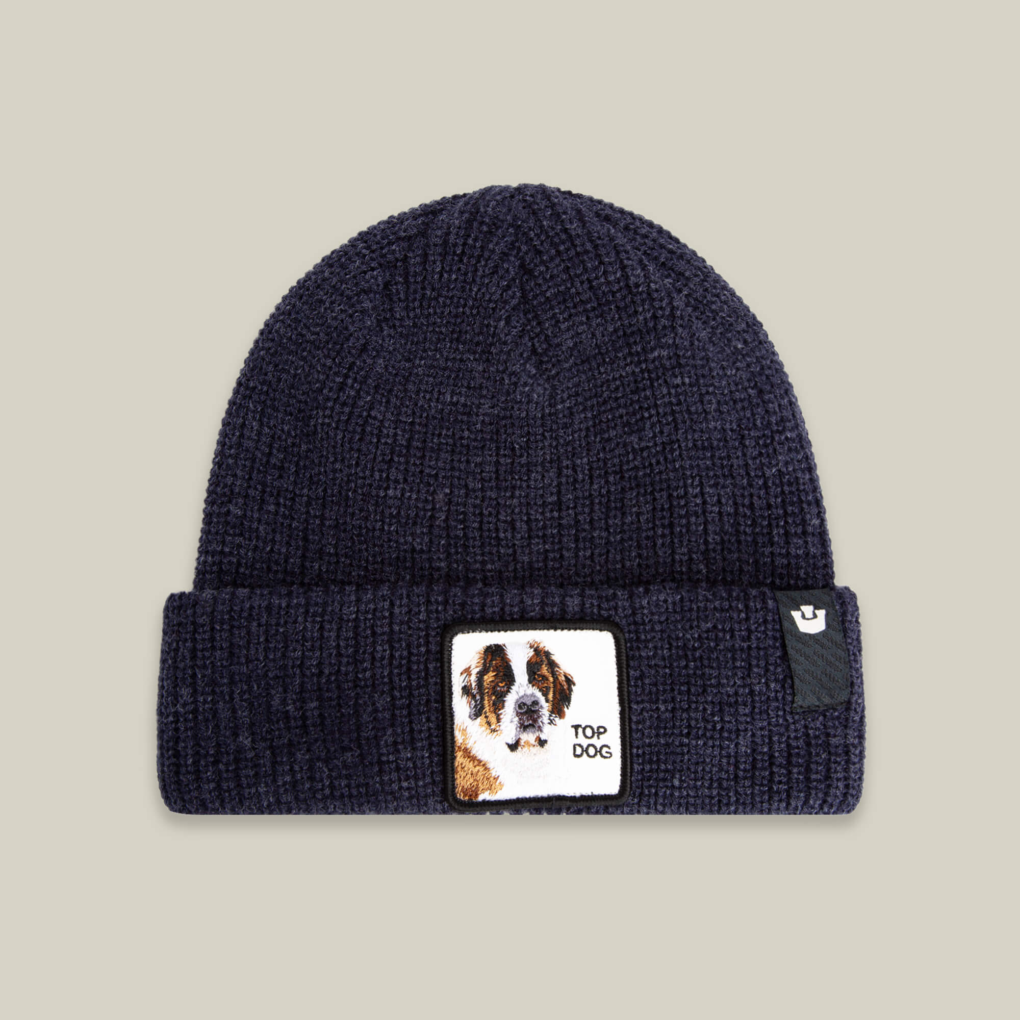 The Top Beanie by Goorin Bros. in GALACTIC features a front St. Bernard patch and TOP DOG text—ideal for dog lovers who want warmth and style.