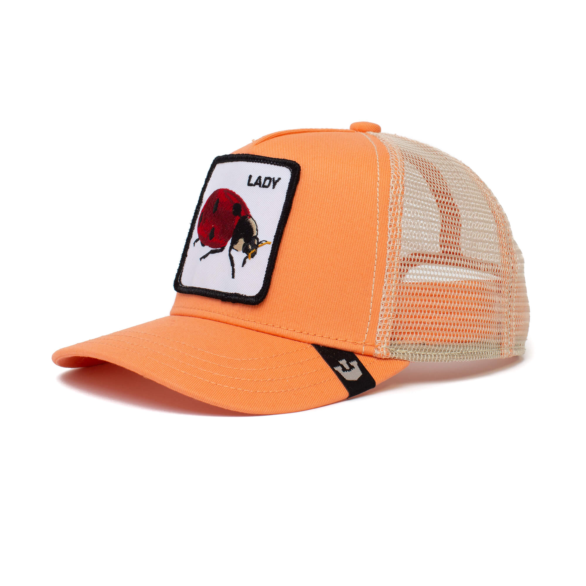The Farm's Little Lady is a kid-sized orange mesh trucker hat with a curved bill, beige mesh back, and a front patch featuring a ladybug and "LADY." Designed for ages 4-10, it offers adjustable comfort.