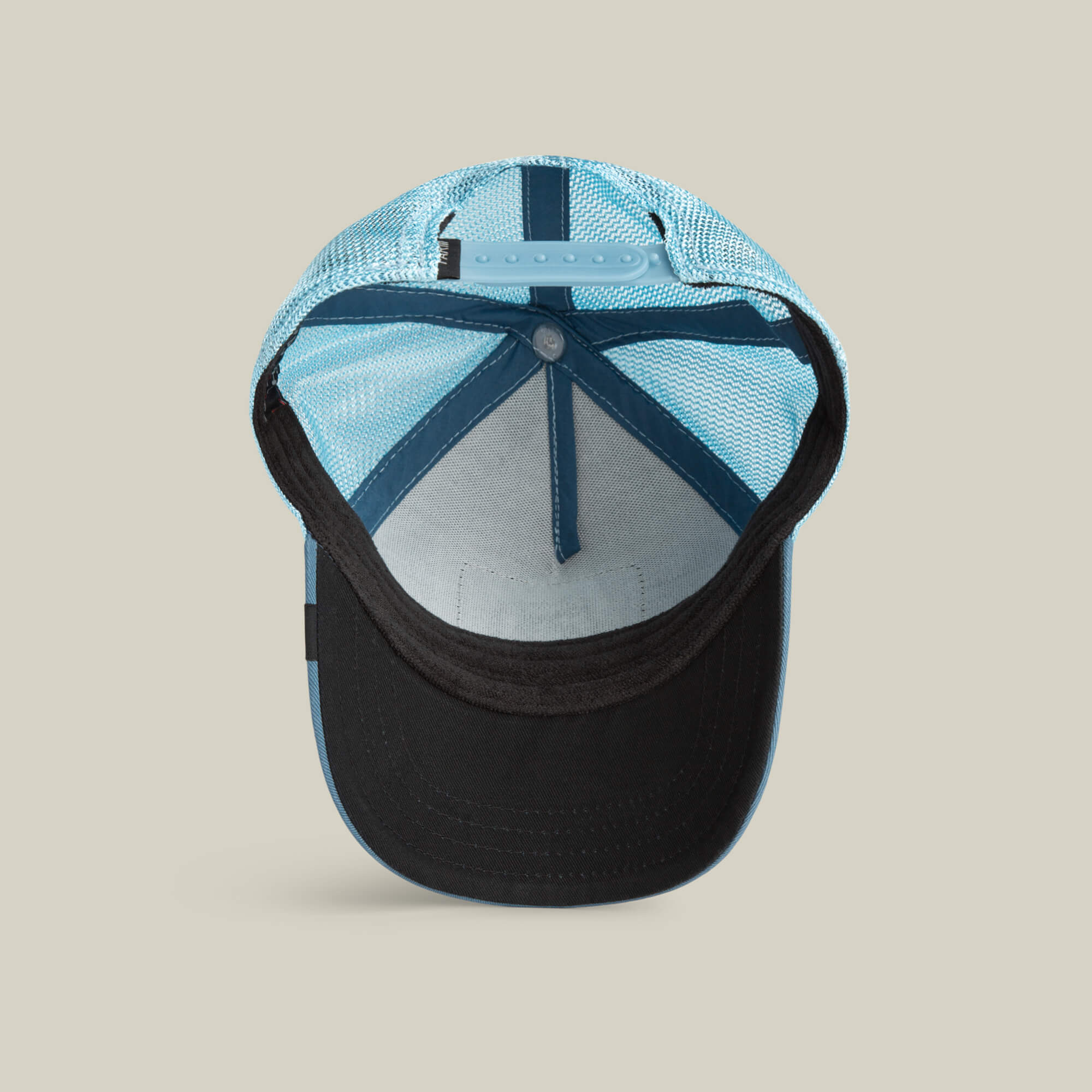 A top-down view of the Goorin Bros. BG2 - Doom (KIDS) blue and black trucker hat highlights the mesh back, adjustable strap, and inner brim—ideal for catching big air or channeling a young aviator look.