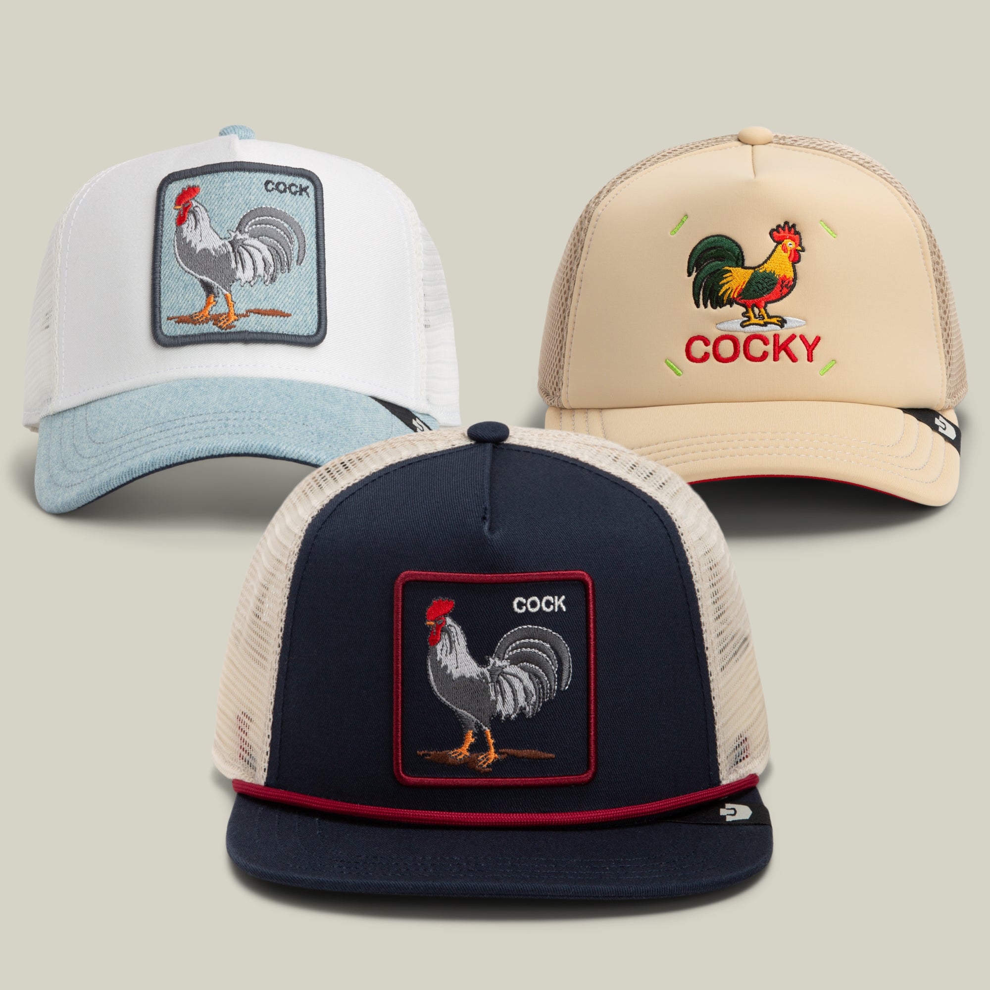 The Why so Cocky? Bundle by Goorin Bros. features three trucker hats, each boasting rooster-themed patches and embroidery—one in blue and white, one in beige, and one in navy—all decked out with witty rooster-inspired text. They’re the ideal accessories for anyone who loves a novelty t-shirt or embraces a bold, cocky shirt style.