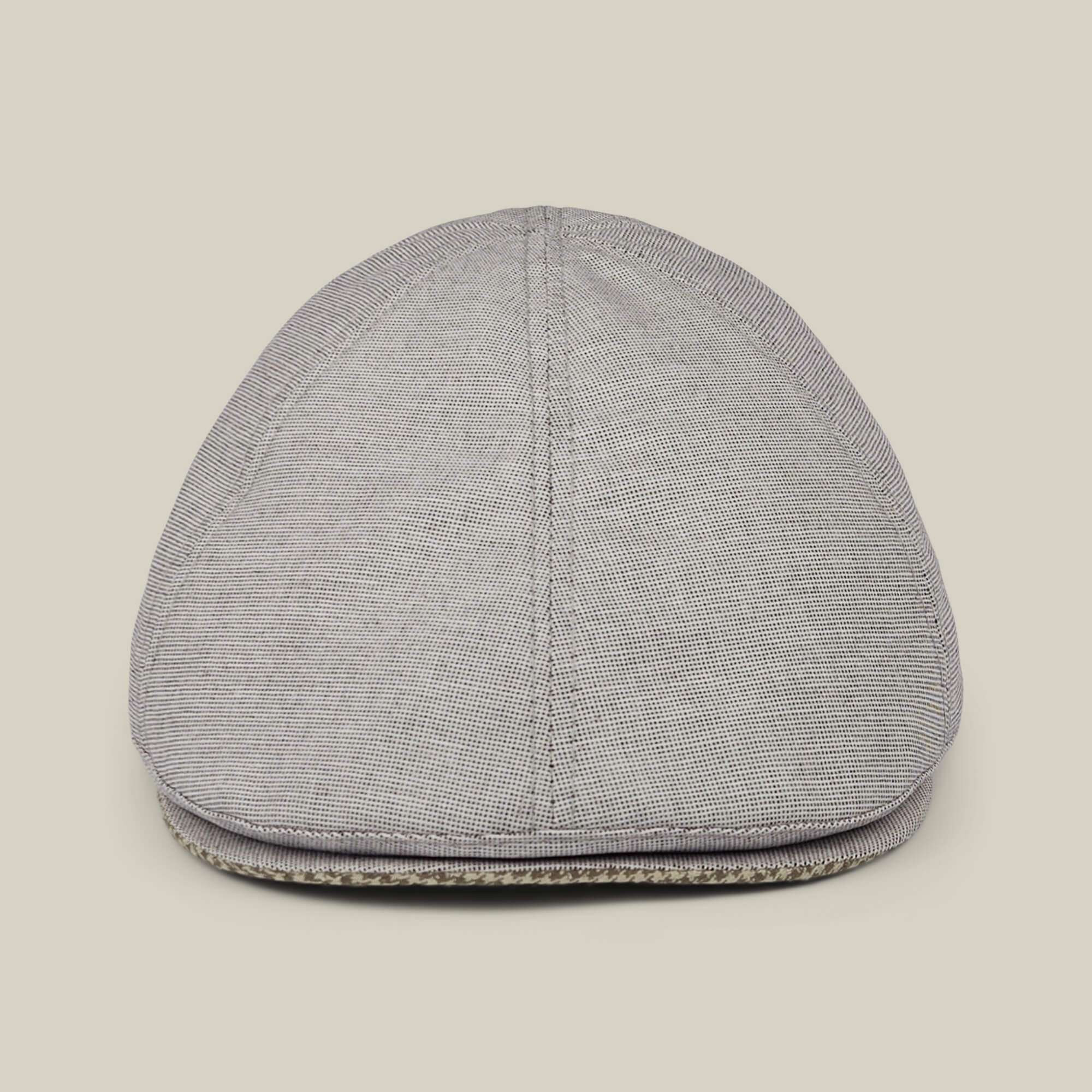 The Mile Rock, a light gray 6 Panel Ivy flat cap by Goorin Bros., is displayed from the front against a plain off-white background, showcasing its hand-cut and sewn craftsmanship.