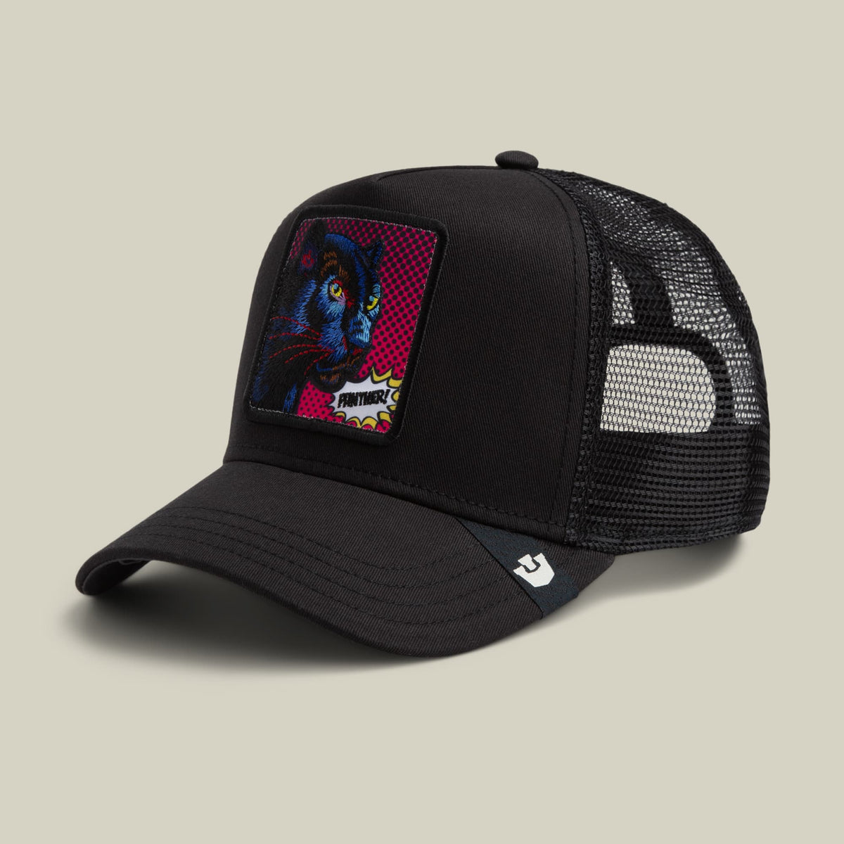 The Goorin Bros. POPArt - Panther trucker hat features a black mesh back with a bold pop art panther patch in blue, red, and yellow on the front, displayed against a neutral background.