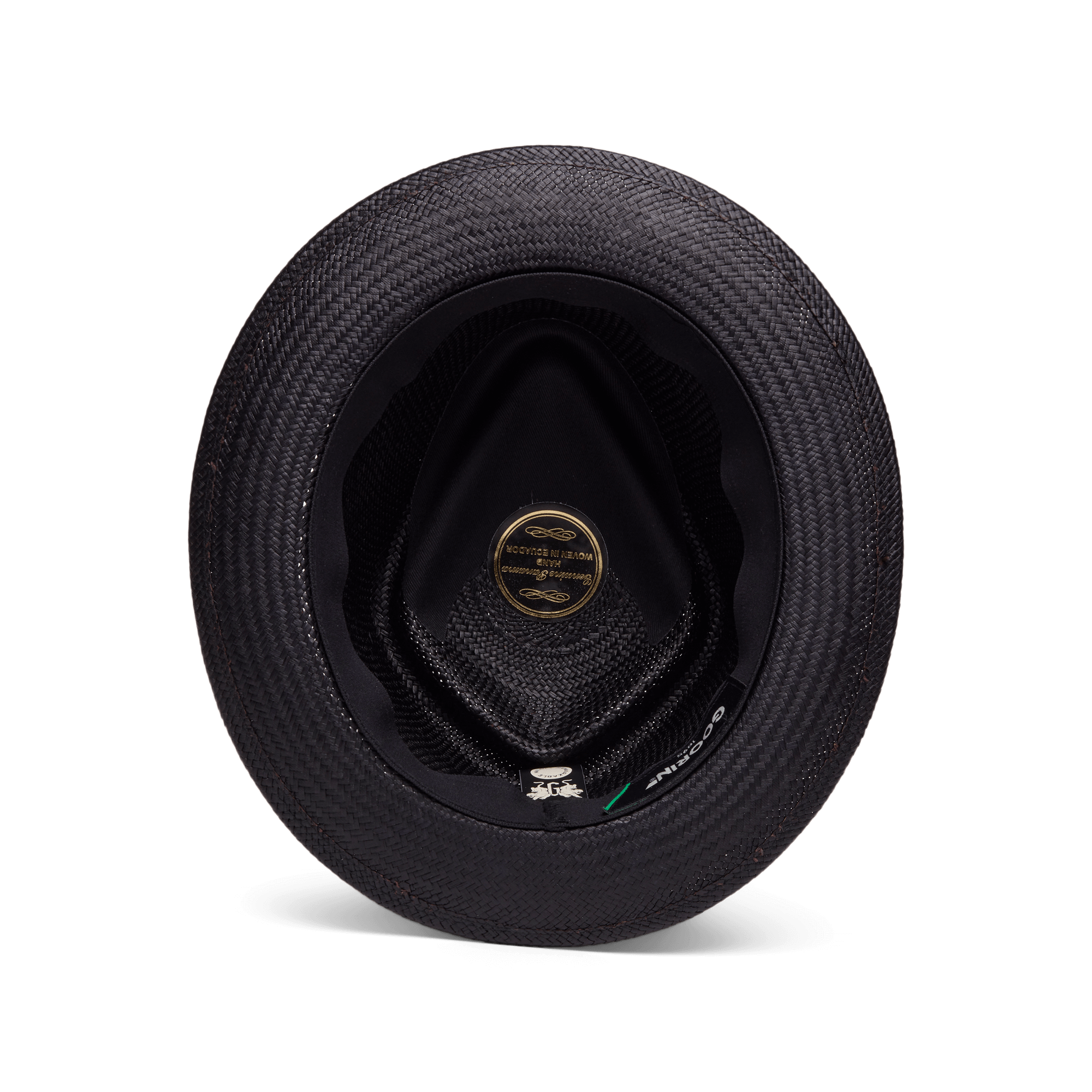Top-down view of the inside of the Goorin Bros. "That's All Folks" straw hat, showing a gold label and black inner band.