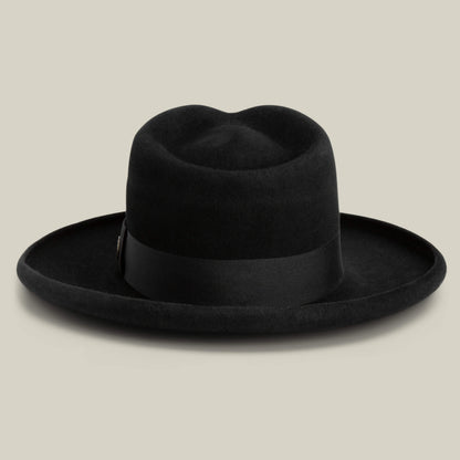 The Colonel Pierce by Goorin Bros. is a black wide-brimmed felt hat with a flat crown and matching ribbon band, shown on a neutral background.