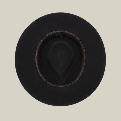 The Goorin Bros. Colonel Pierce is a black wide-brimmed hat pictured from above, highlighting its inner lining and oval opening against a simple light background.