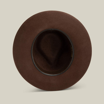 Top view of the Goorin Bros. Colonel Pierce hat in brown, featuring a teardrop crown, wide brim, and black inner band, displayed on a plain light background.