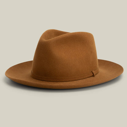 The Goorin Bros. Night Hawk is a brown felt teardrop crown fedora with a wide snap brim and matching band, shown against a light beige background.