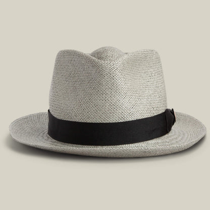 The Goorin Bros. John Sr. is a light gray toquilla teardrop fedora with a black crown band and 50 UPF sun protection, shown on a plain beige background.