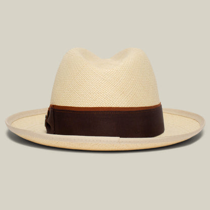 The Hartman by Goorin Bros. is a light straw fedora with a wide brim and a dark brown grosgrain band for classic style.