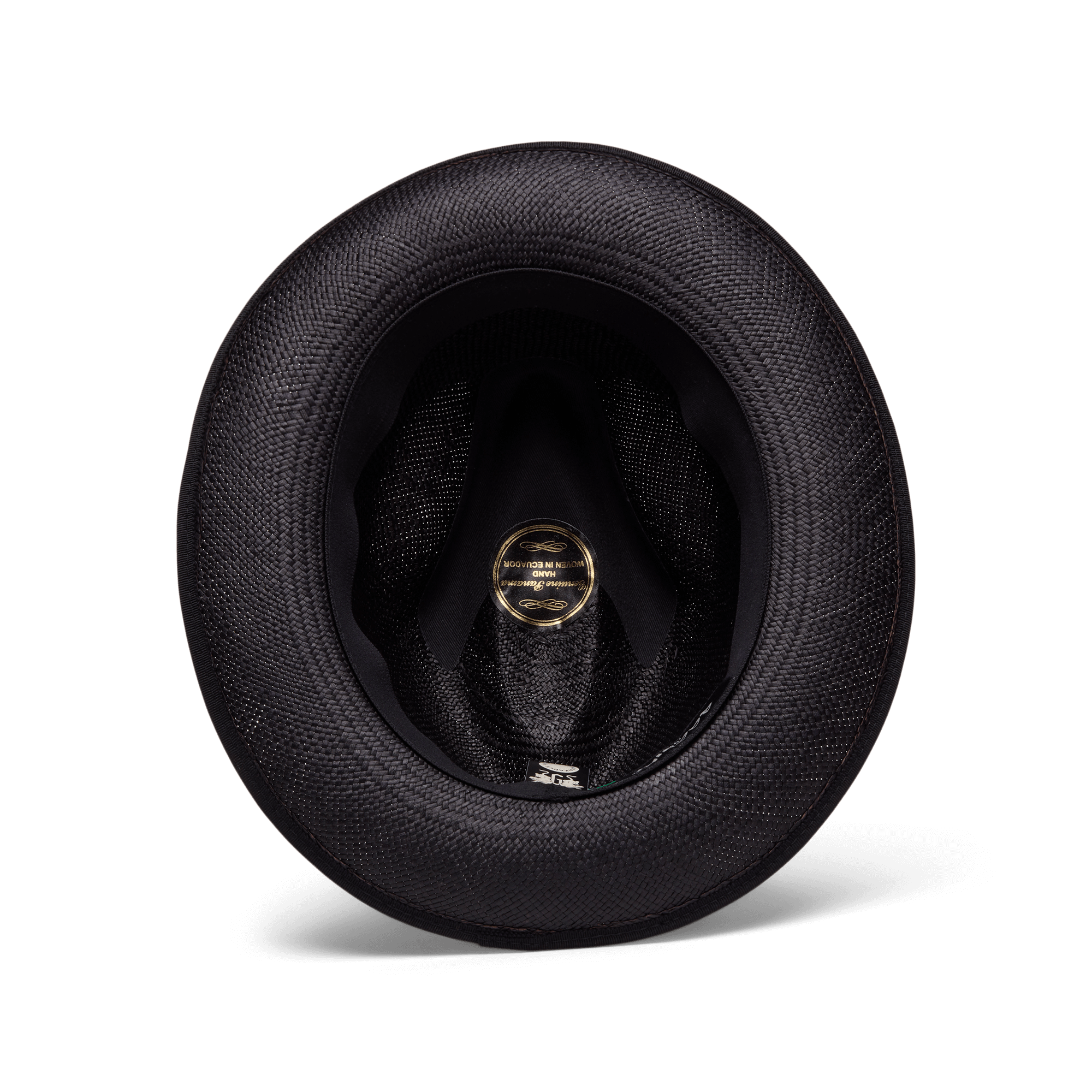 Top-down view of the inside of the Goorin Bros. Hartman hat in black, showcasing its textured finish, grosgrain band, gold and black center label, and contrasting edge binding along the inner band.