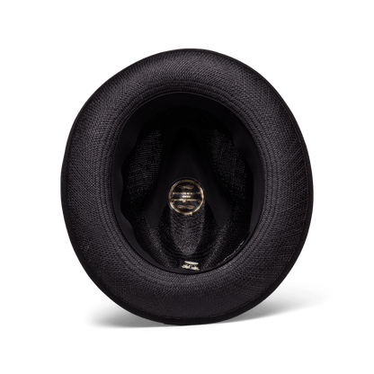 Top-down view of the inside of the Goorin Bros. Hartman hat in black, showcasing its textured finish, grosgrain band, gold and black center label, and contrasting edge binding along the inner band.