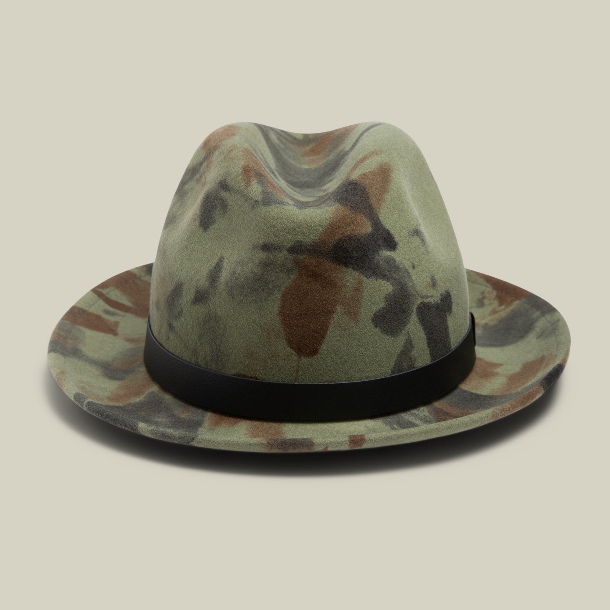 Dean the Butcher by Goorin Bros. is a camouflage fedora with a black grosgrain hatband, shown against a beige background.