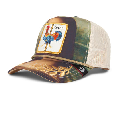 The Farm Sicut Mentula trucker mesh hat features a rooster patch labeled COCKY on the front, brim embroidery, and a wheat graphic on the bill.