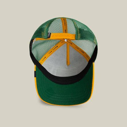 The Bulletproof Rhino by The Farm: green and yellow mesh-back trucker hat shown from inside, highlighting inner seams and adjustable strap. All Sales Are Final.