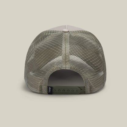 The Bandit Coyote by The Farm is a khaki mesh trucker hat shown from the back with an adjustable snapback and a small black tag on the left—ideal for anyone with outlaw energy and a wild spirit.