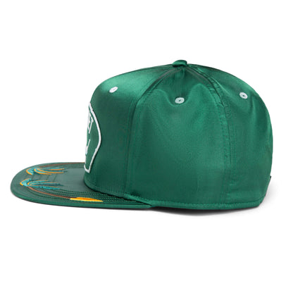 The Yolo snapback by Goorin Bros. features green satin, white eyelets, and embroidered designs on the brim for island vibes—ideal for your next adventure. Shown from a side angle.
