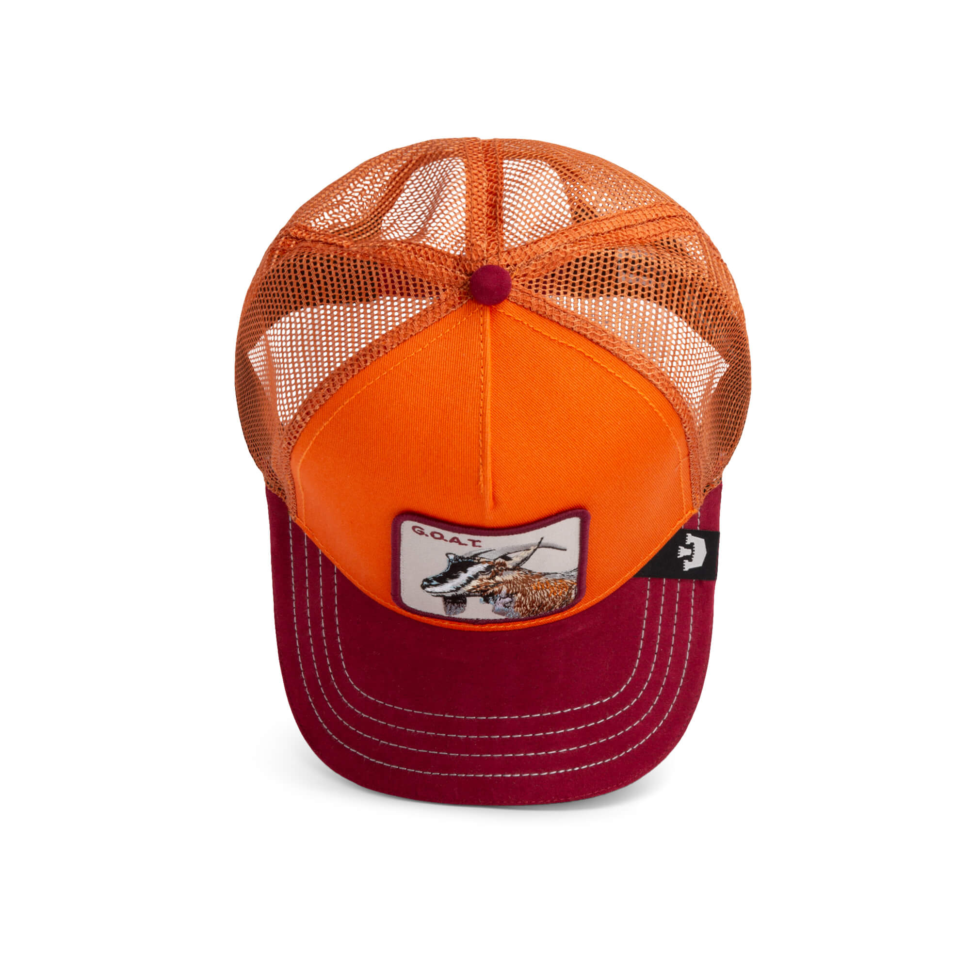 Orange and red trucker hat by The Farm, called Greatest Grazer, with a mesh back and front patch featuring an animal graphic and "G.O.A.T." All sales are final.