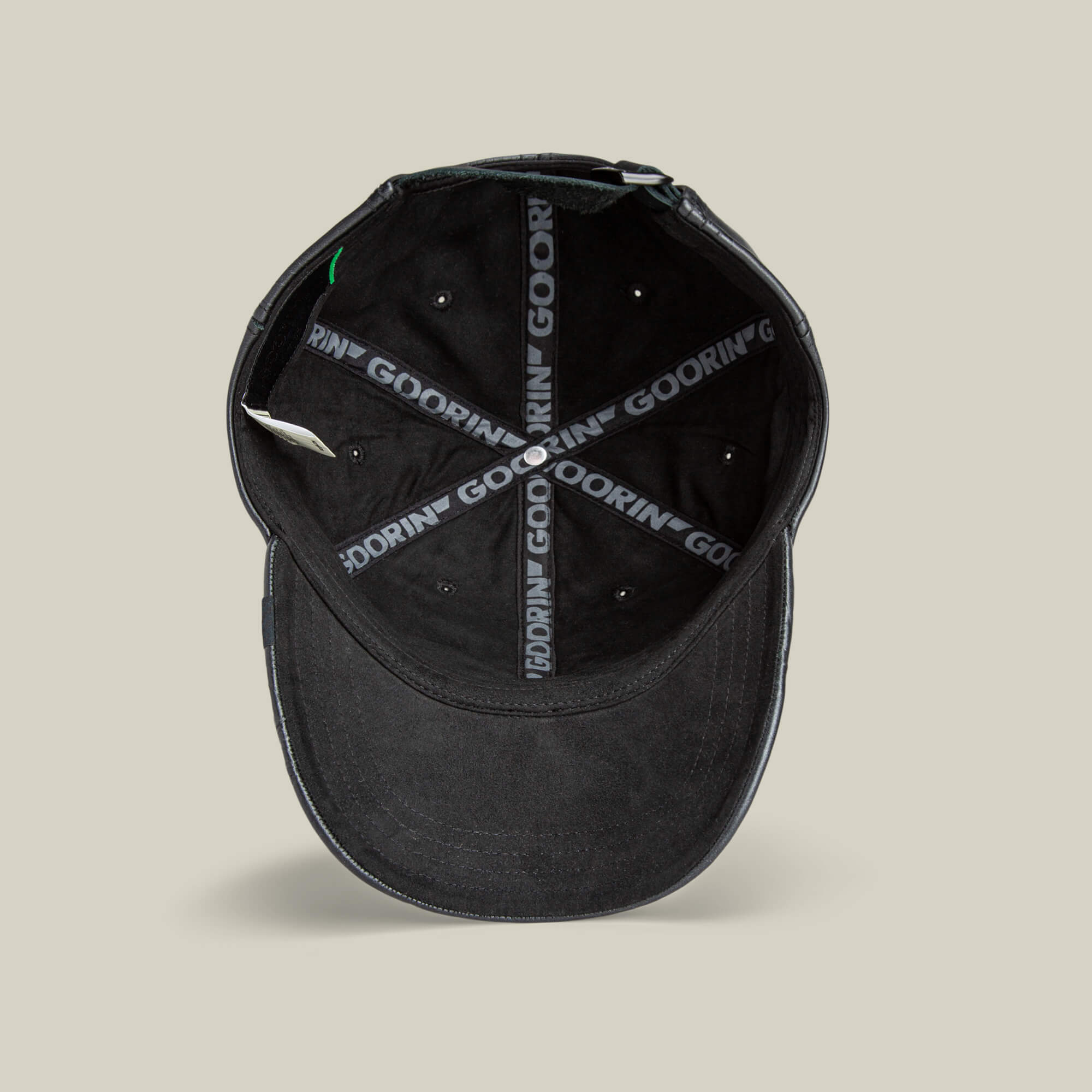 The Goorin Bros. "Put a Panther On It" hat in black is shown from above, highlighting its interior with black seams and “GOORIN” branding—an everyday classic fit.