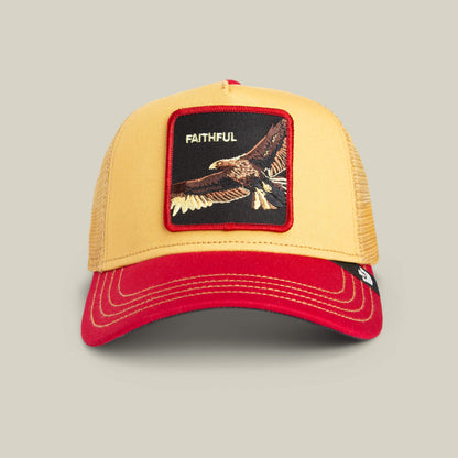 The Faithful Eagle by Goorin Bros. is a bold yellow and red cap with a front patch depicting an eagle in flight and the word FAITHFUL above it.