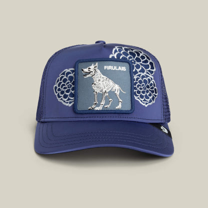 The Goorin Bros. Dia De Firulais hat in celestial blue features white floral designs and a patch with a skeletal dog and "FIRULAIS" on the front.