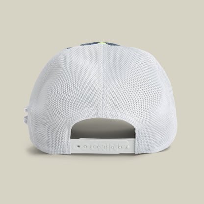 A back view of the white mesh Trance baseball cap by Goorin Bros., featuring an adjustable snapback closure against a beige background—ideal for festivals.
