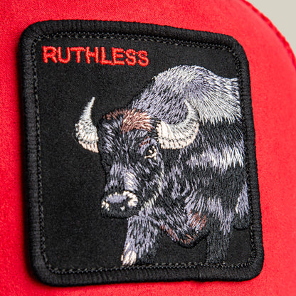 A close-up of the Goorin Bros. Suede Buffalo patch featuring an embroidered buffalo and the word RUTHLESS in red at the top left.