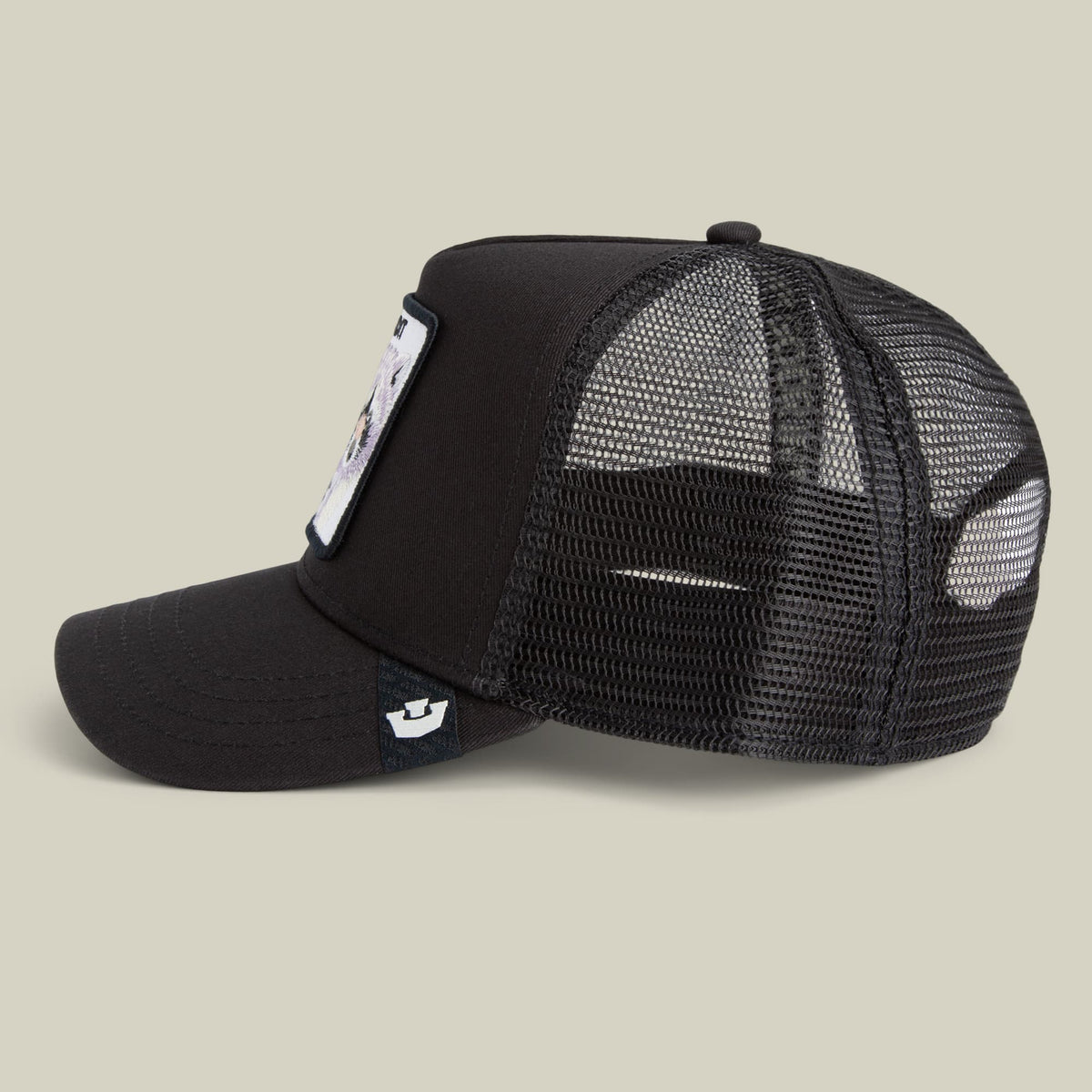 The Goorin Bros. Bandit Trucker is a black mesh snapback cap featuring a solid front panel and breathable mesh back, displayed against a neutral background.