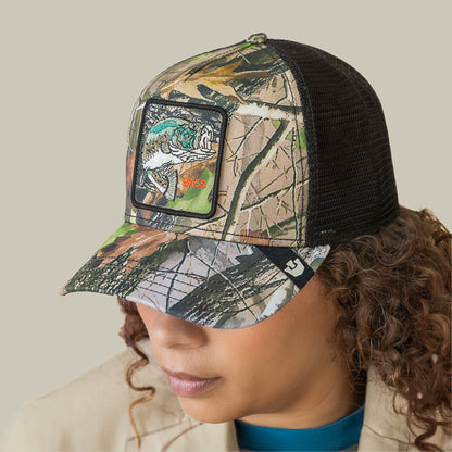 Wearing the Goorin Bros. Camouflage Bass trucker hat, featuring a mesh back and a bold bass patch, shows off stylish fishing pride.