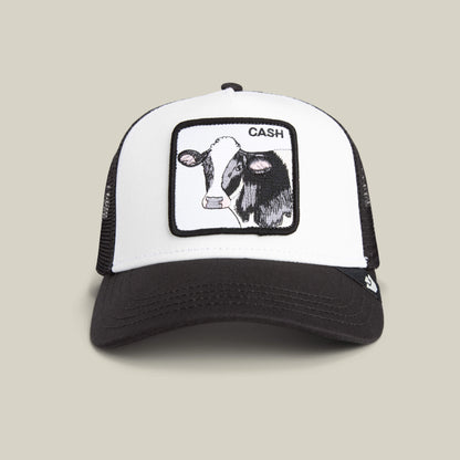 The Goorin Bros. Cash Cow Trucker is a black and white hat featuring a bold cow patch with "Cash Cow" on the front.