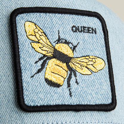 Add a royal flair to your style with the Denim Queen patch by Goorin Bros., featuring an embroidered yellow and black bee and the word "QUEEN" stitched above on classic denim.