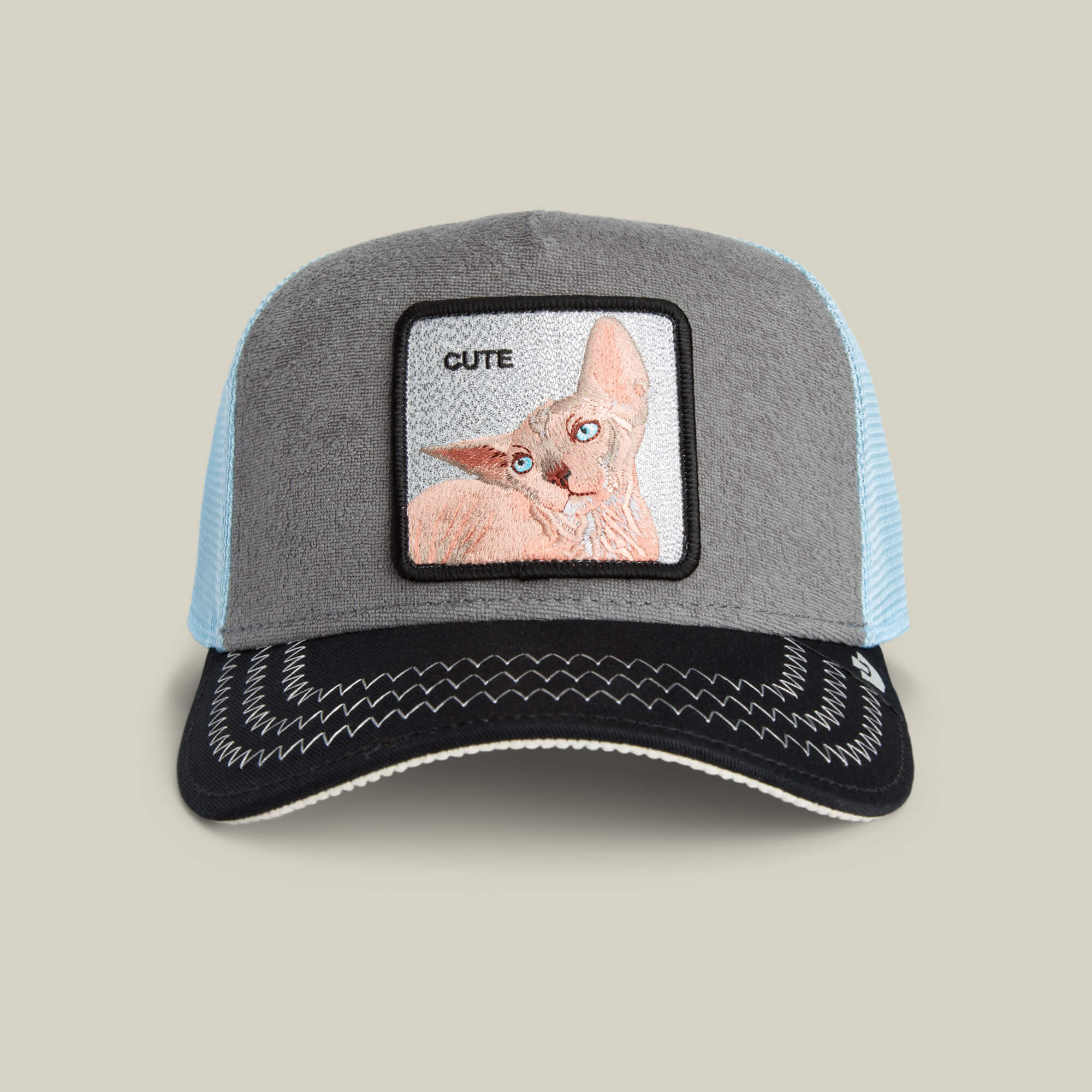 The Goorin Bros. Cute Remix is a gray terry cloth hat featuring an image of a hairless cat.